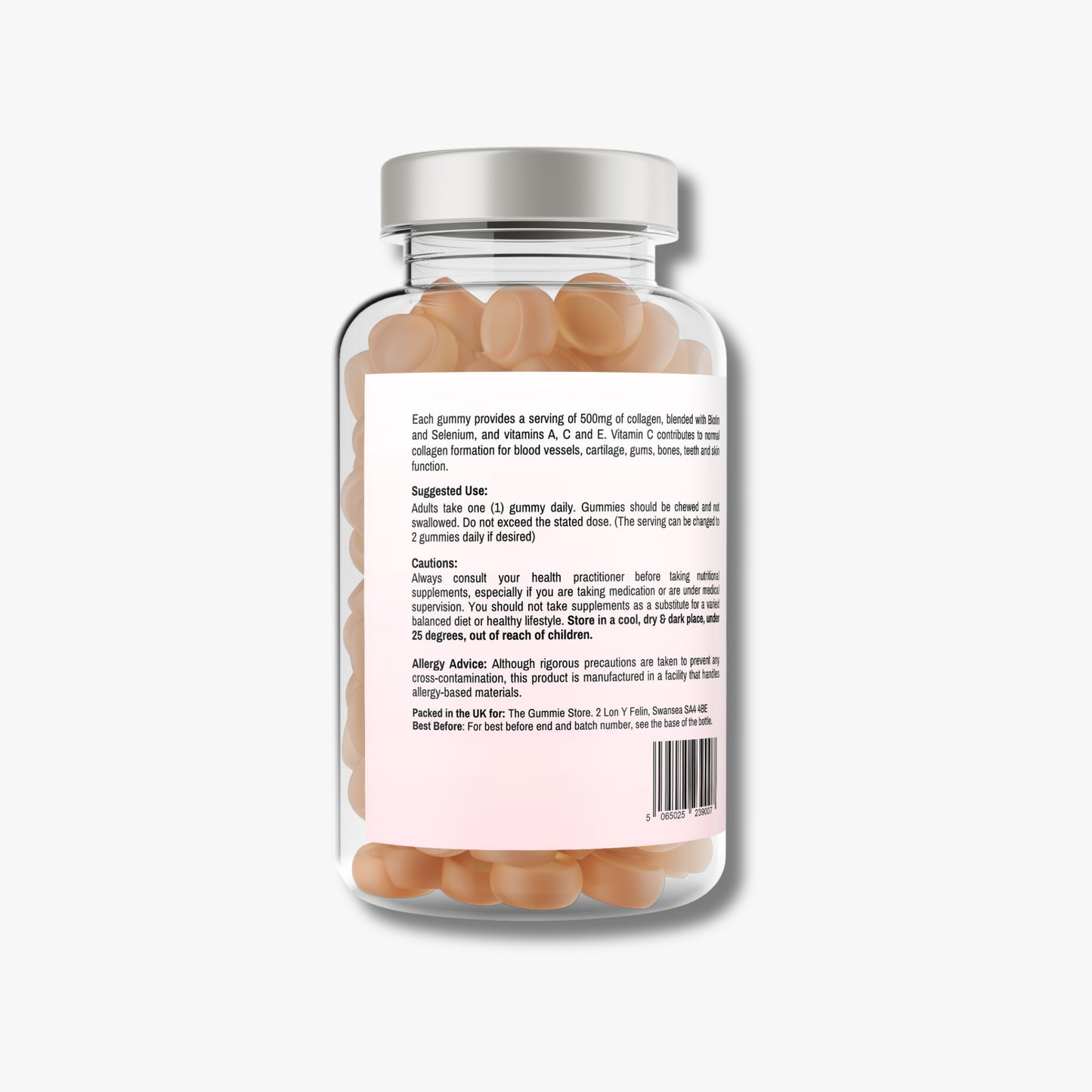 Glass supplement bottle with pink capsules and label on a white background
